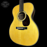 Front angle of Used Martin Custom Shop OM-28 Adirondack / Wild East Indian Rosewood.