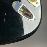 Wear on body of Used 1988 MIJ Squier Black.