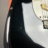 Wear on body of Used 1988 MIJ Squier Black.