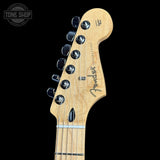 Fender guitar headstock on a black background with 'Tone Shop' logo.