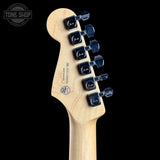 Guitar headstock with tuning pegs on a black background, featuring the Tone Shop logo.