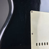 Wear on back of Used 1988 MIJ Squier Black.