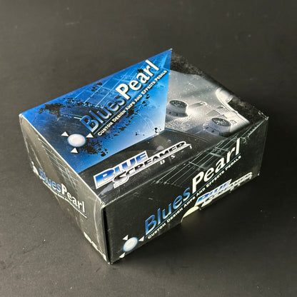 Blues Pearl audio effect pedal packaging on a dark background