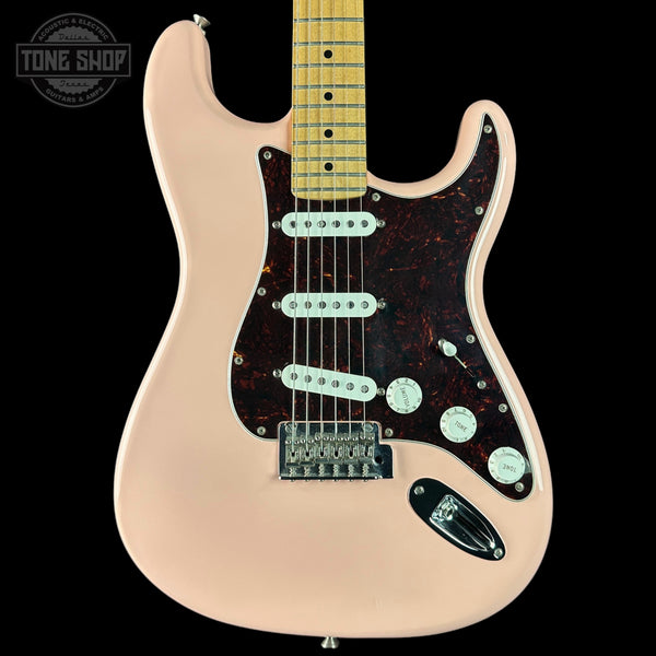 Beige electric guitar with a black pickguard on a white background, featuring 'Tone Shop' branding.