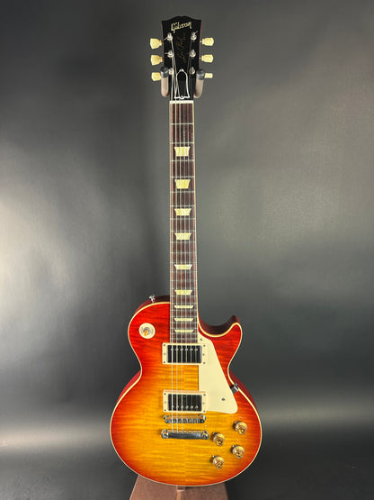 Electric guitar with a sunburst finish on a dark gray background