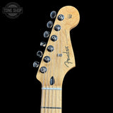 Fender guitar headstock on a black background with 'Tone Shop' logo.