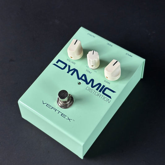 Vertex Dynamic Distortion guitar effects pedal on a dark background