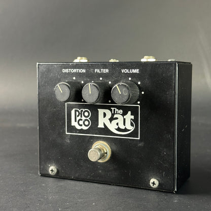 Pro Co The Rat guitar effects pedal on a gray background