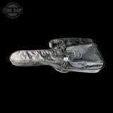 Guitar case with a visible brand logo on a black background