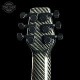 Carbon fiber guitar neck with tuning pegs on a black background, featuring 'Tone Shop' branding.