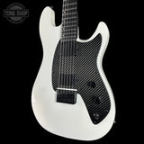 White electric guitar with carbon fiber pattern on a black background, featuring 'Tone Shop' logo.