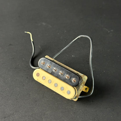 Guitar pickup on a dark gray background