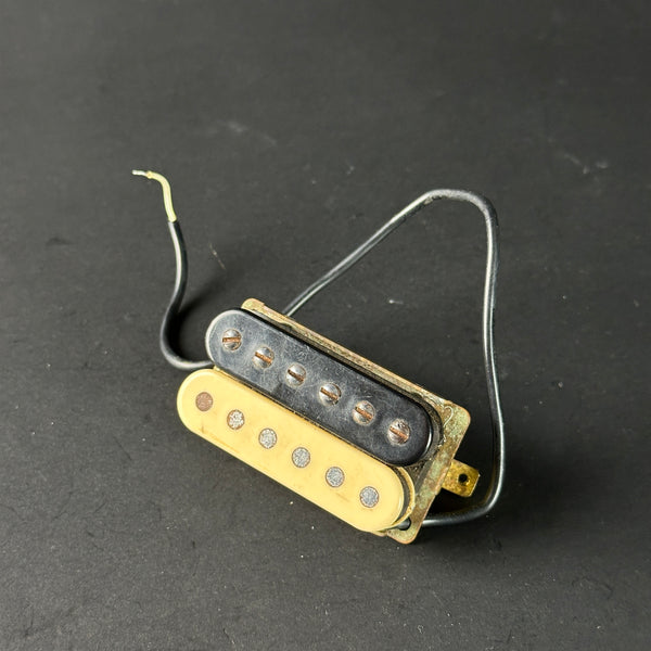 Guitar pickup on a dark gray background