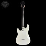 White electric guitar with a black strap on a white background, featuring 'Tone Shop' branding.