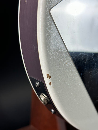 Chip near output jack of Used Danelectro Double Neck 6/12 White.