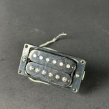 Guitar pickup on a dark gray background