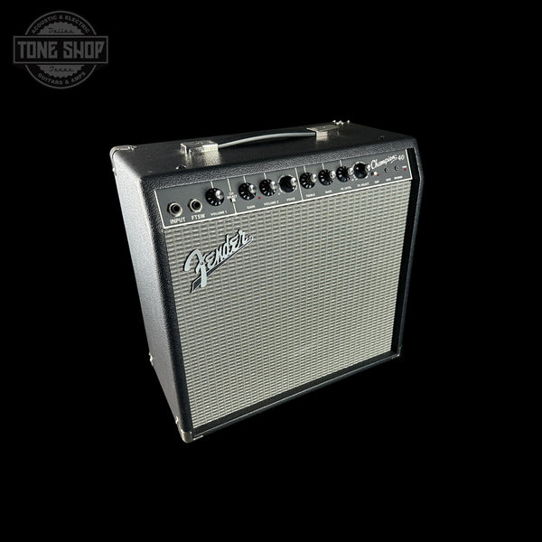 Fender guitar amplifier on a black background with 'Tone Shop' logo.