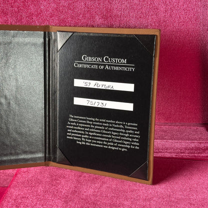 Gibson Custom Certificate of Authenticity on a pink textured background