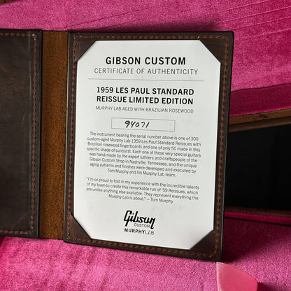 Gibson Custom Certificate of Authenticity for a 1959 Les Paul Standard Reissue Limited Edition on a pink background