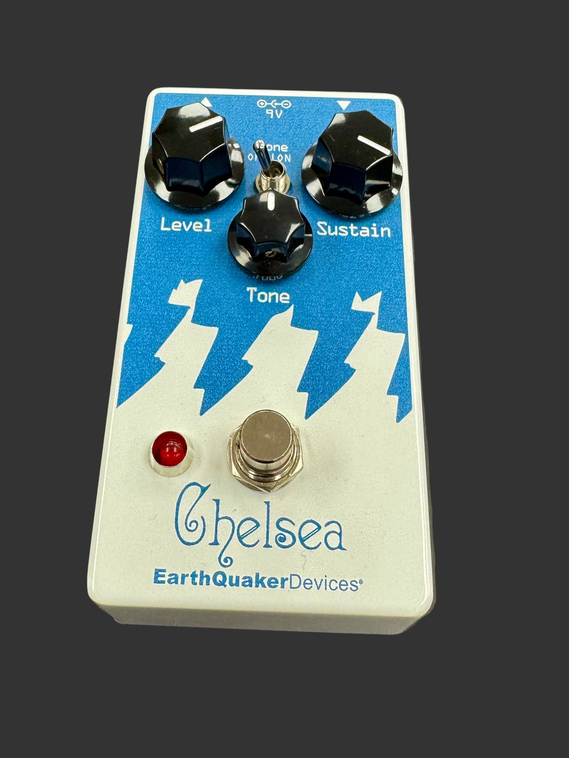 Guitar effects pedal with 'Chelsea' branding on a gray background