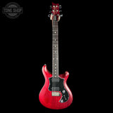 Red electric guitar on a black background with 'Tone Shop' logo.