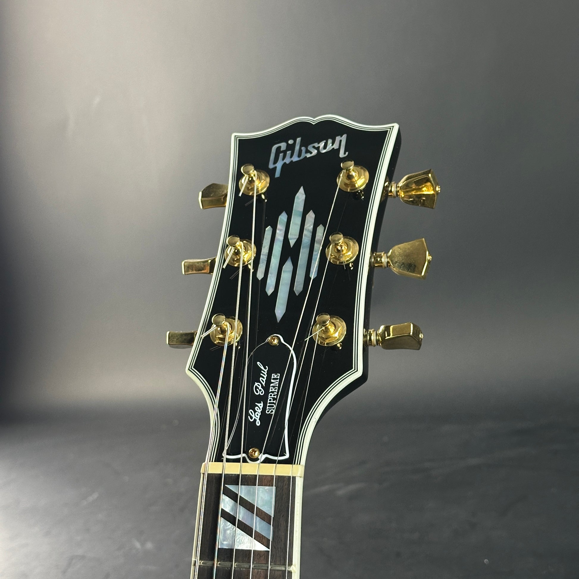 Headstock of Used Gibson Les Paul Supreme Fireburst.