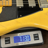 Used K-Line Texola Butterscotch Blonde on scale displaying weight.