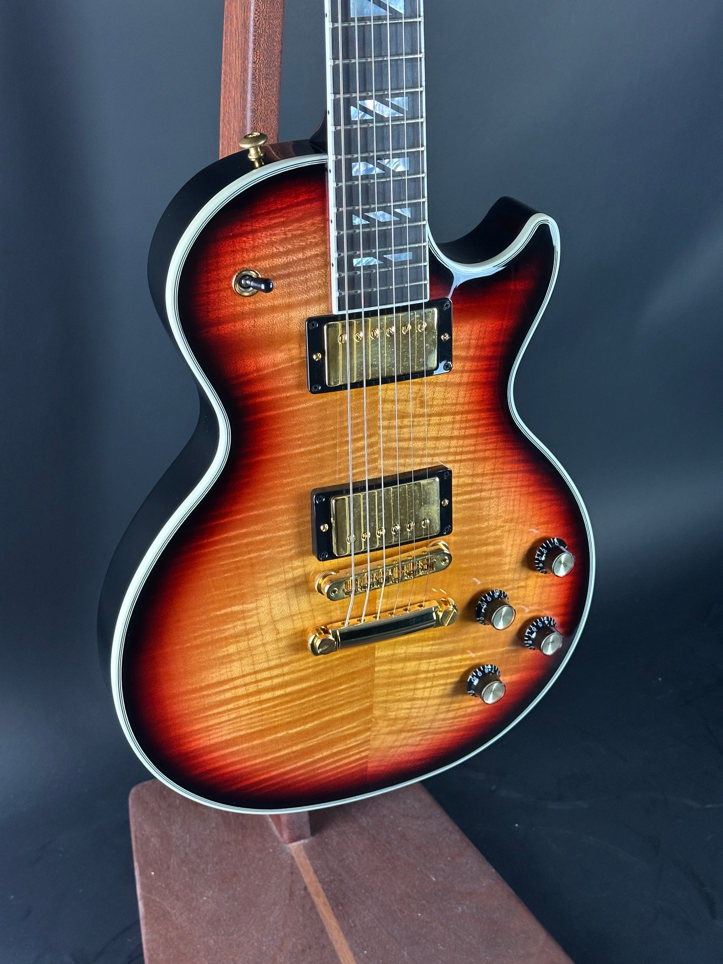 Front angle of Used Gibson Les Paul Supreme Fireburst.