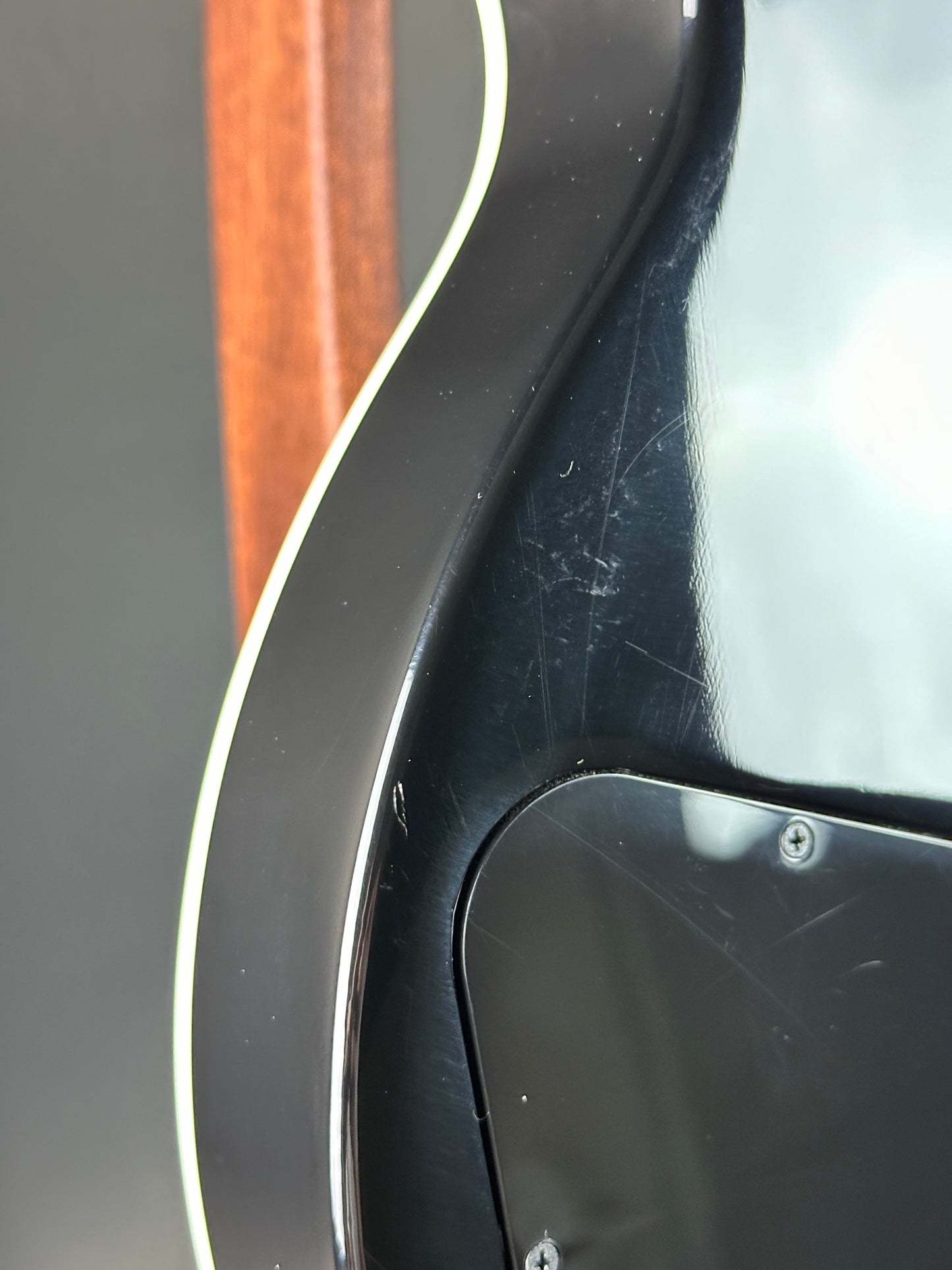 Wear on back of Used Gibson Les Paul Supreme Fireburst.