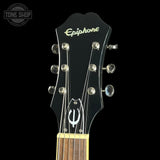 Guitar headstock with Epiphone logo on a black background