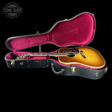 Gibson Hummingbird Elegant Koa Honey Burst in case.