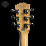 Back of headstock of Gibson Hummingbird Elegant Koa Honey Burst.