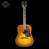 Full front of Gibson Hummingbird Elegant Koa Honey Burst.