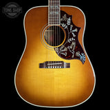 Front of Gibson Hummingbird Elegant Koa Honey Burst.