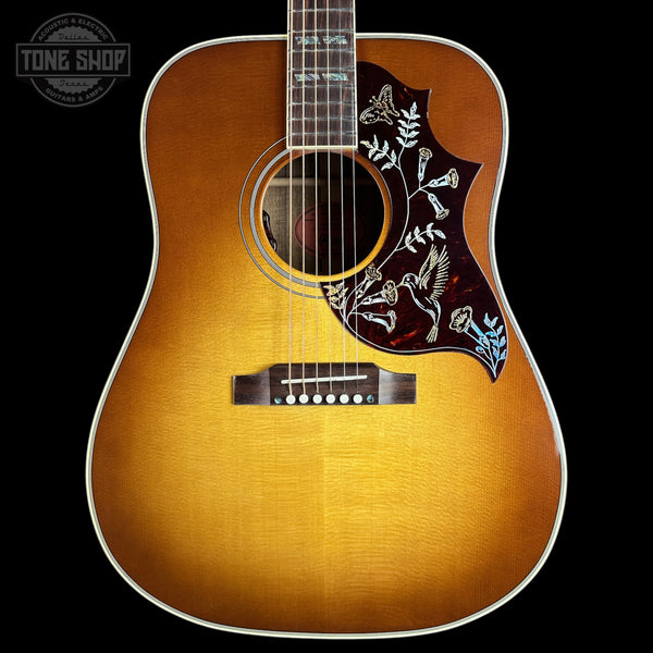 Front of Gibson Hummingbird Elegant Koa Honey Burst.