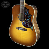 Front angle of Gibson Hummingbird Elegant Koa Honey Burst.