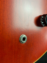 Metal nut on a wooden surface