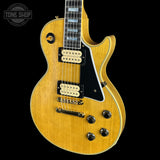 Front angle of Gibson Custom Limited 57 Les Paul Custom All Korina Antique Natural VOS.