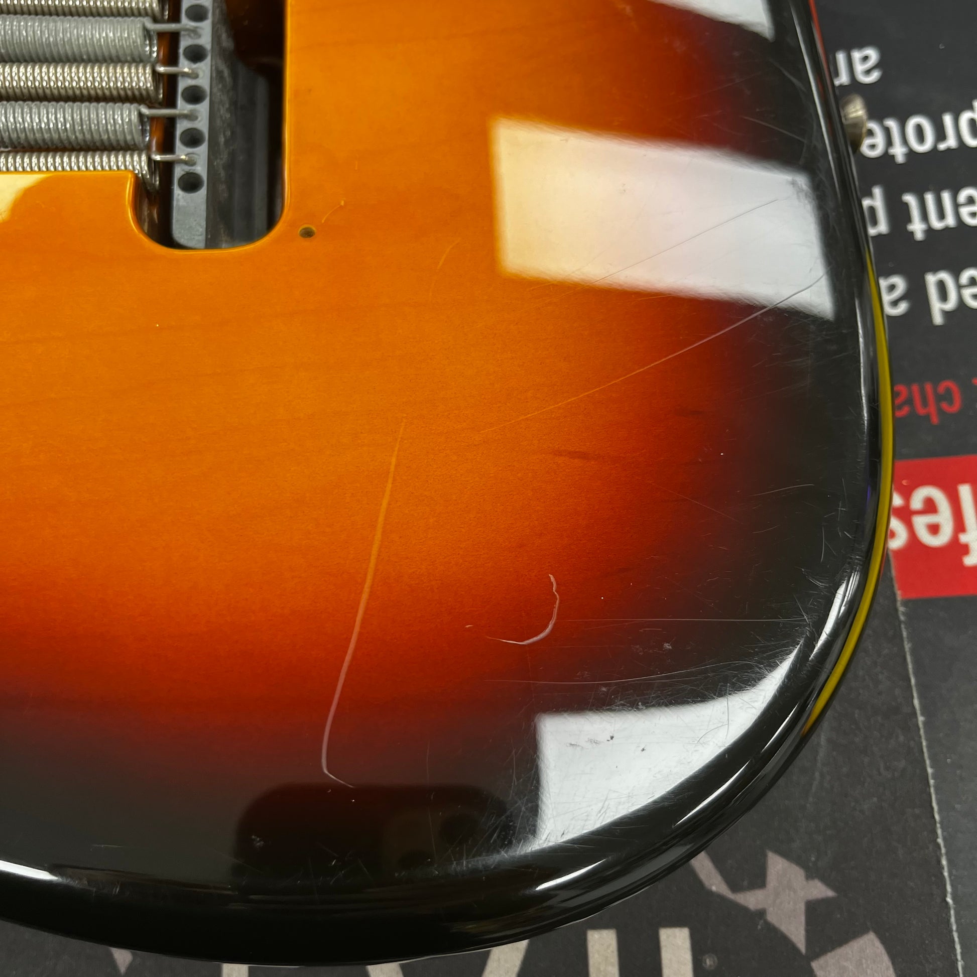 Scratches on the back of Used 2005 Fender Standard Straocaster RW Brown Sunburst w/Bag TFW2659