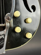 Wear near controls of Vintage 1960s Silvertone 1446 Black.