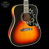 Front angle of Gibson Custom Made 2 Measure Hummingbird Maple Long Scale Tri-burst LR Baggs VTC.