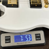 Used Epiphone SG Custom Alpine on scale displaying weight.