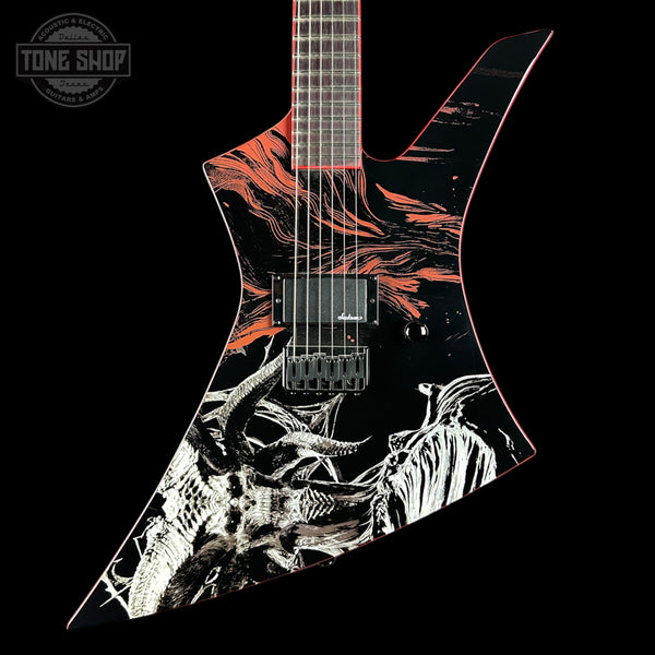 Guitar with artistic design on a black background, featuring the Tone Shop logo.