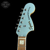 Headstock of Used 2024 Squier Limited Edition Paranormal Troublemaker Telecaster Deluxe Ice Blue Metallic.