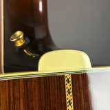 Wear on back of Used 2006 Gibson Western Classic Sunburst.