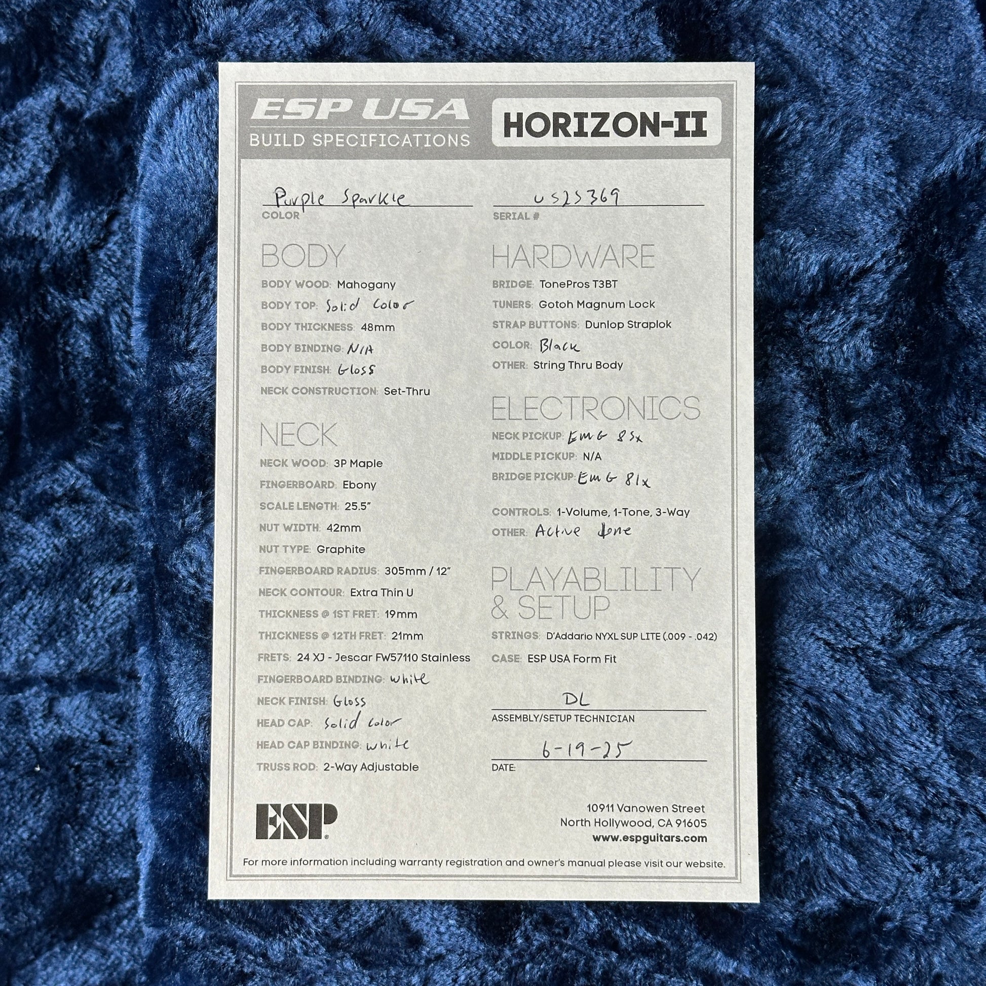 ESP USA Horizon-II guitar build specifications sheet on a textured blue surface