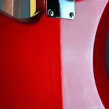 Wear on back of Used Fender CIJ JM-62 Jazzmaster Candy Apple Red.
