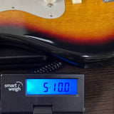 Used 1960s Guyatone "Tokyo Sound Company" Saturn 530 on scale displaying weight.