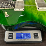 PRS S2 Wood Library McCarty 594 Singlecut Quilt Eriza Verde on scale displaying weight.