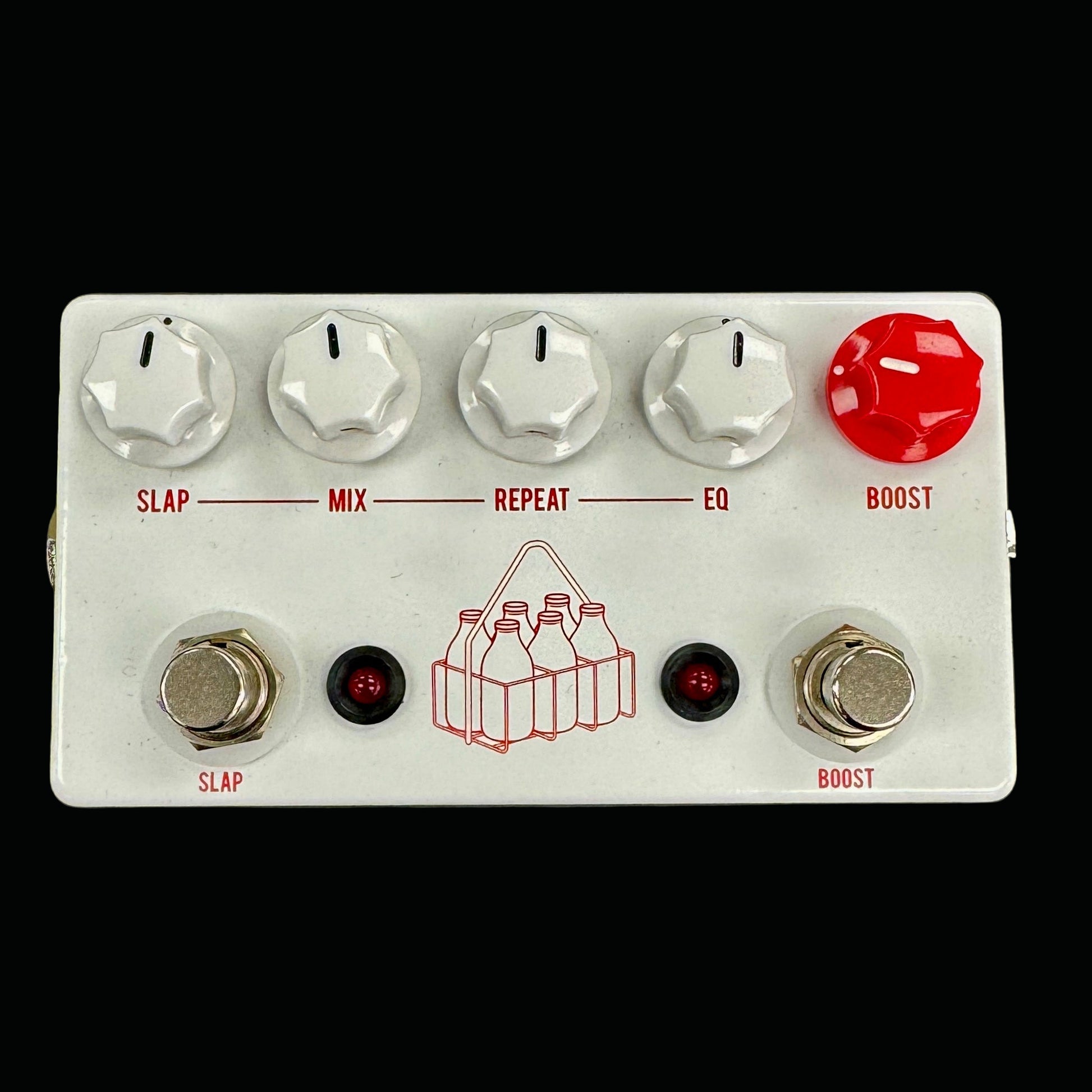 Guitar effects pedal with various knobs and buttons on a gray background